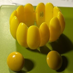 Lovely lucite yellow bracelet with yellow earrings clip ons